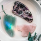 The energy of Amethyst is calming and peaceful. The stone is often used in meditation practices. As a facial tool, it soothes inflamed skin and promotes relaxation.  Gua Sha is a healing modality from traditional Chinese medicine. Facial Gua Sha is a gentle technique for delicate areas. 